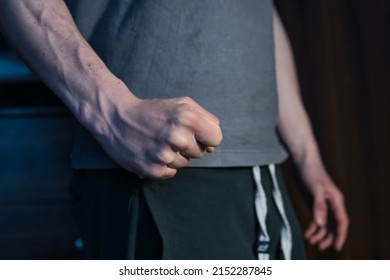 close-up on the fist of an aggressive man. a concept showing violence against people, domestic violence, frustration, irritation and anger