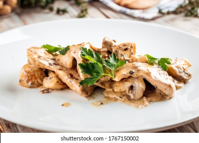 Closeup On Gourmet Tender Chicken Fillet With Mushrooms And Creamy Sauce, Horizontal