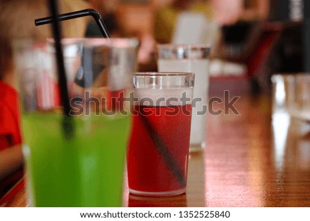 Closeup on green, white and red cocktails