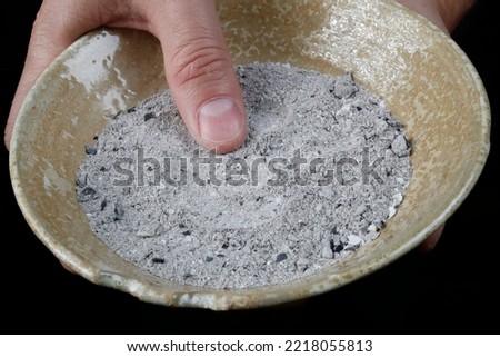 Close-up on hands and ashes.  Ash Wednesday celebration. Lent season. 