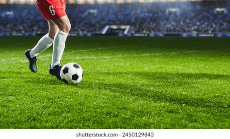 Close-Up On Legs Of Professional Football Player Dribbling With A Ball During International Soccer Championship On National Arena. Athlete Running To Score A Winning Goal In Final Match On Big Stadium - Powered by Shutterstock