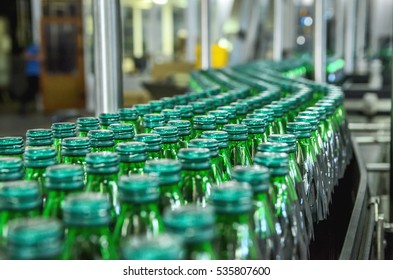 Closeup On Mineral Water Bottles In Raw And Lines