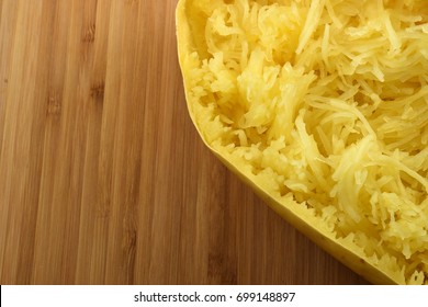 Closeup On A Roasted Spaghetti Squash On A Wooden Board