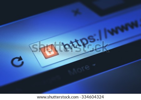 Closeup on the screen with depth of field and focus on the padlock. The image is a security concept in the search engine and web browser address. Hyper Text Transfer Protocol Secure (https).