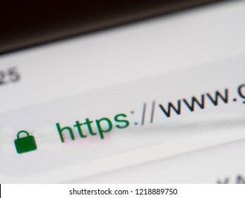 Closeup on smartphone display screen with https and www url. Security concept in search engine and web browser address. Hyper Text Transfer Protocol Secure https. Shallow DOF,