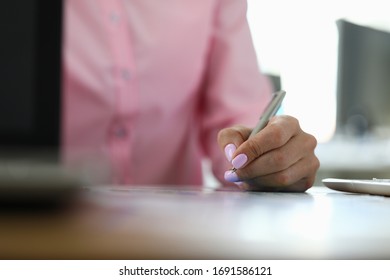 Close-up On Table Female Hands Take Notes With Pen. Remote Work From Home During Quarantine. Lack Office Work. Downtime Due To Force Majeure Situations. Crisis In Economy, Job Search Remotely