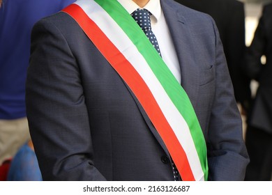 Close-up on the tricolor band of the Italian mayor. Italian politics, mayor elections - Shutterstock ID 2163126687