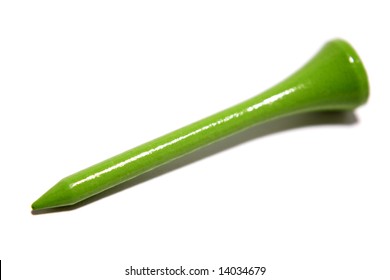 Closeup Of One Green Wooden Golf Tee Isolated Over White Background