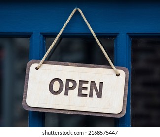 Close-up Of An OPEN Sign On A Shop Doorway.