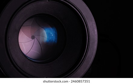 Close-up optical close-up black DSLR camera with closed iris diaphragm blades cine lens - Powered by Shutterstock