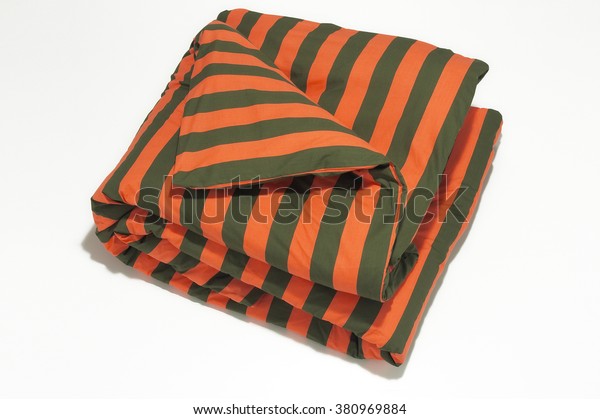 Closeup Orange Striped Comforter On White Interiors Stock Image