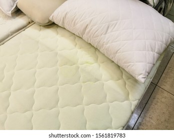 closeup of orthopedic mattress and pillows