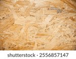 Close-Up of OSB Wooden Texture, Natural Construction Material Background