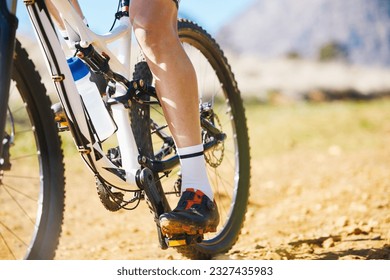 Closeup, outdoor and biker with fitness, cycling and training for a competition, road and sneakers. Zoom, male person or cyclist with workout goal, nature or travel with performance athlete or sports - Shutterstock ID 2327435983