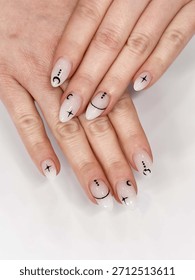 Close-up of oval nails with basic designs, Basic Oval Nails, Minimal Nail Art, Trendy Manicure Design