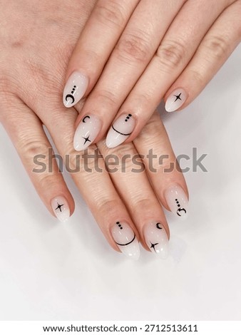 Close-up of oval nails with basic designs, Basic Oval Nails, Minimal Nail Art, Trendy Manicure Design