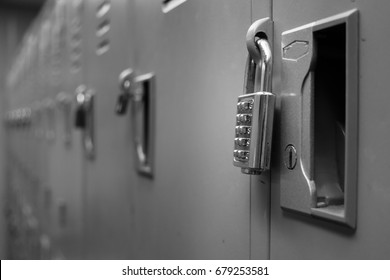 Closeup padlock with key number hanging on locker for concept technology data log security on black and white. - Powered by Shutterstock - Get 15% off with code: PIKWIZARD15