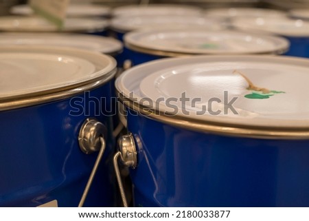 close-up of paint cans in the store