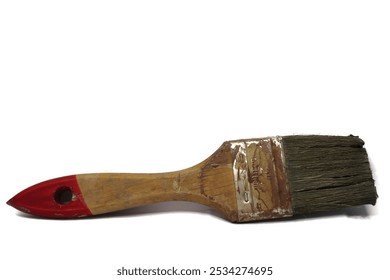 A close-up of a paintbrush. The brush has a wooden handle with a red tip and a worn-out bristle. - Powered by Shutterstock