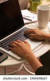 Close-up Of A Pair Of Business Woman Hands Typing In A Brand New Laptop