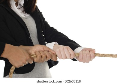 Close-up of a pair of hands pulling on a rope. - Powered by Shutterstock