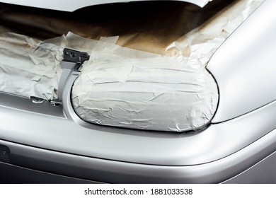 Close-up Of A Part Of A Newly Painted Car In The Workshop