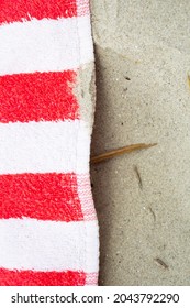 Closeup Of A Part Of A Red And White Beach Towel.