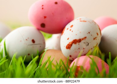 Close-up of pastel colored Easter eggs on grass