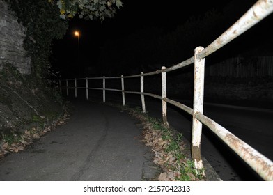 A Closeup Of Path With Wooden Barricade At Night In The City Of Lisbon