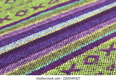 Closeup Pattern And Texture Of Purple And Lime Green Thai Northern Region's Traditional Textile