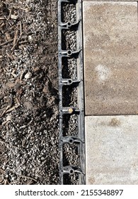 Closeup Of Paver Edging On A New Pathway At A Residential Construction Site.