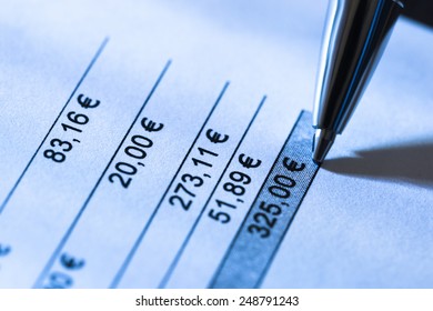 Close-up Of Pen On Total Amount Due In Invoice 