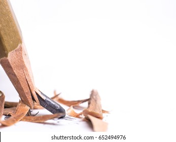 Closeup pencil with a broken tip on white  background - Powered by Shutterstock