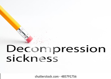 Closeup Of Pencil Eraser And Black Decompression Sickness Text. Decompression Sickness. Pencil With Eraser.