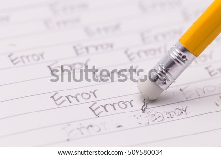 closeup of a pencil eraser correcting an error , concept pencil erasing an 