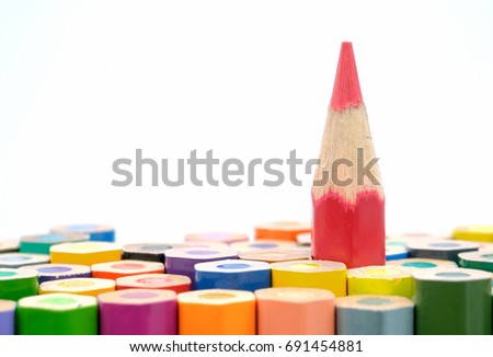 Close-up of pencils white background, stand out of the crowd concept