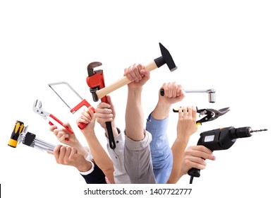 Close-up Of People's Hand Holding Carpentry Tools Against White Background - Powered by Shutterstock - Get 15% off with code: PIKWIZARD15