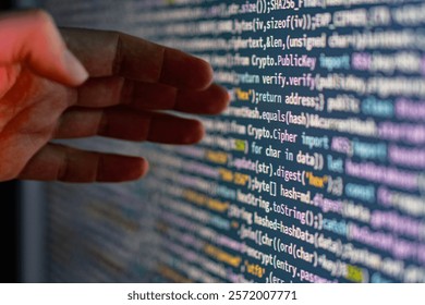 Close-up of a person coding on a computer screen a