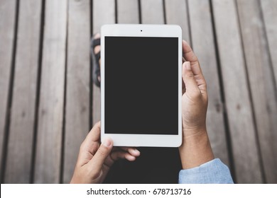 close-up person hold digital tablet blank screen