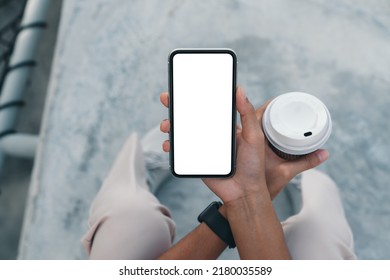 close-up phone on hand holding above view angle - Shutterstock ID 2180035589