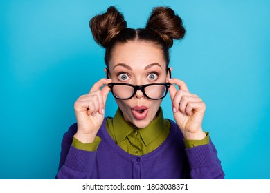 Closeup Photo Of Attractive Shocked Lady Two Funny Buns Crazy Good Mood Amazed Perfect Eyesight Without Specs Wear Shirt Collar Violet Sweater Isolated Blue Color Background