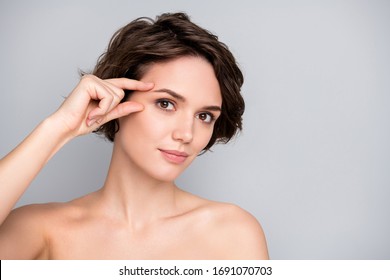 Closeup photo of beautiful bob hairdo lady nude naked shoulders tempting appearance fingers check eyebrow eye line no wrinkles face isolated grey color background