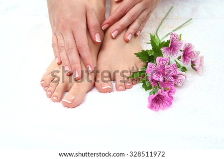 Closeup photo of a beautiful female feet with pedicure.