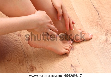 Closeup photo of a beautiful female feet with pedicure
