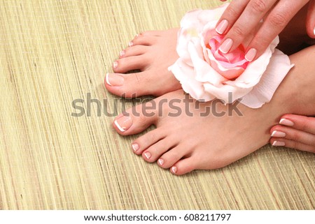 Closeup photo of a beautiful female feet with pedicure
