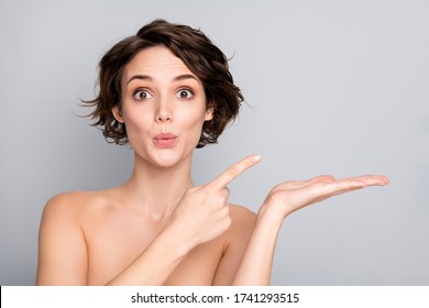 Closeup photo of beautiful naked lady bob short hairdo showing new spa salon procedure on open arm direct finger shocked isolated grey color background