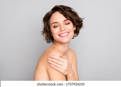 Closeup Photo Of Beautiful Naked Tender Lady Model Bobbed Short Hairstyle Positive Emotions Touch Shoulder Silky Skin Eyes Closed Isolated Grey Color Background