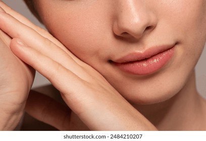 Close-up photo of a beautiful young woman's face with fresh and smooth skin and pink lips with a light background _ smooth skin with skin and body care  - Powered by Shutterstock