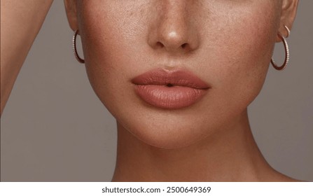 Close-up photo of a beautiful young woman's face with fresh and smooth skin and pink lips with a light background _ smooth skin with skin and body care  - Powered by Shutterstock