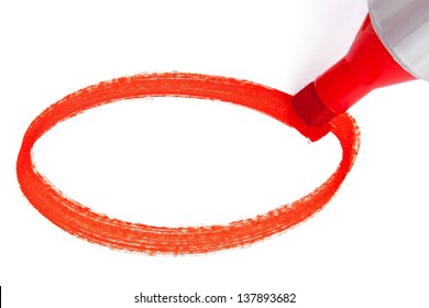 Close-up Photo Of A Big Red Felt Tip Marker Pen Writing An Empty Circle On White Paper